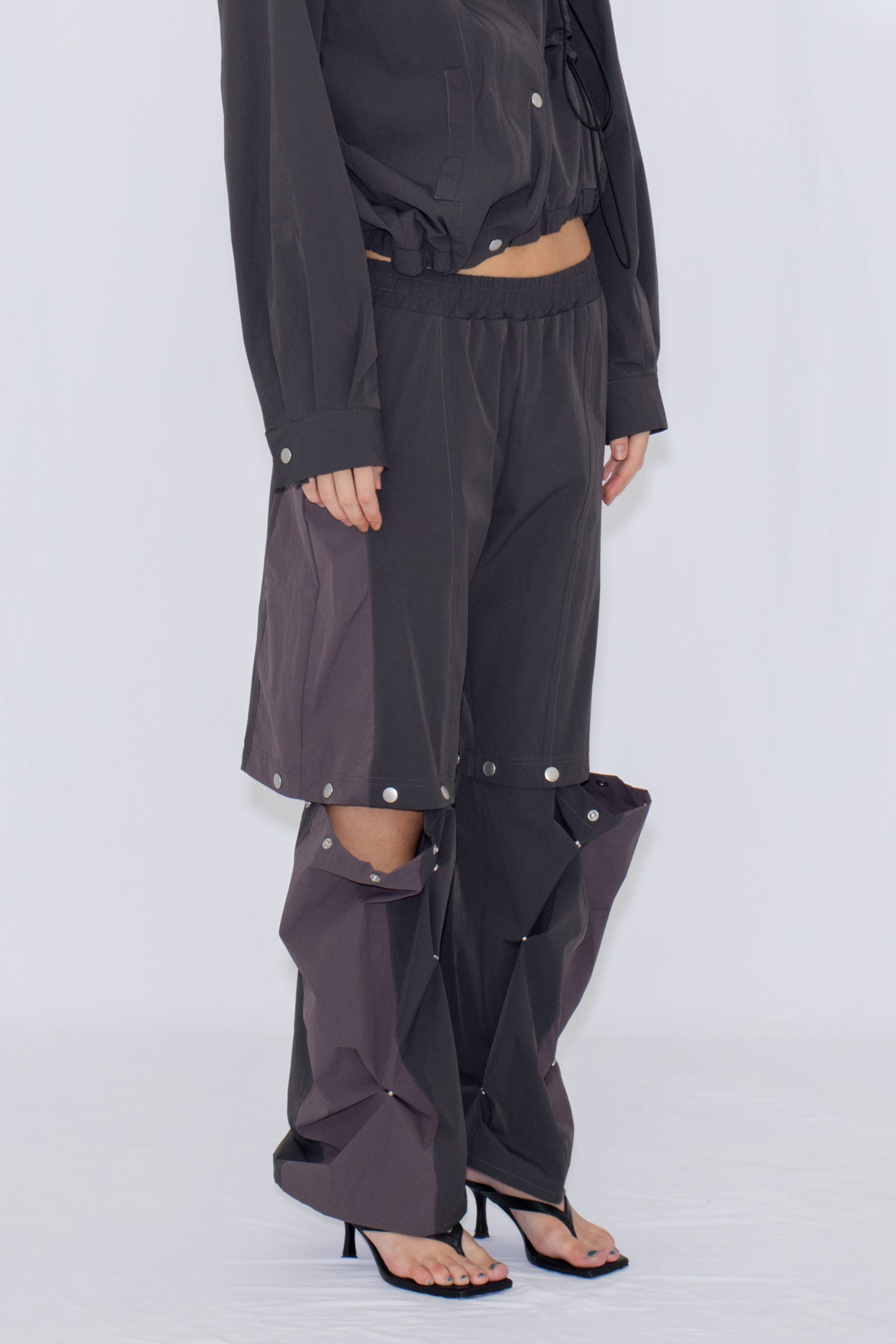 2WAY DEFORMED TRACK PANTS / CHARCOAL