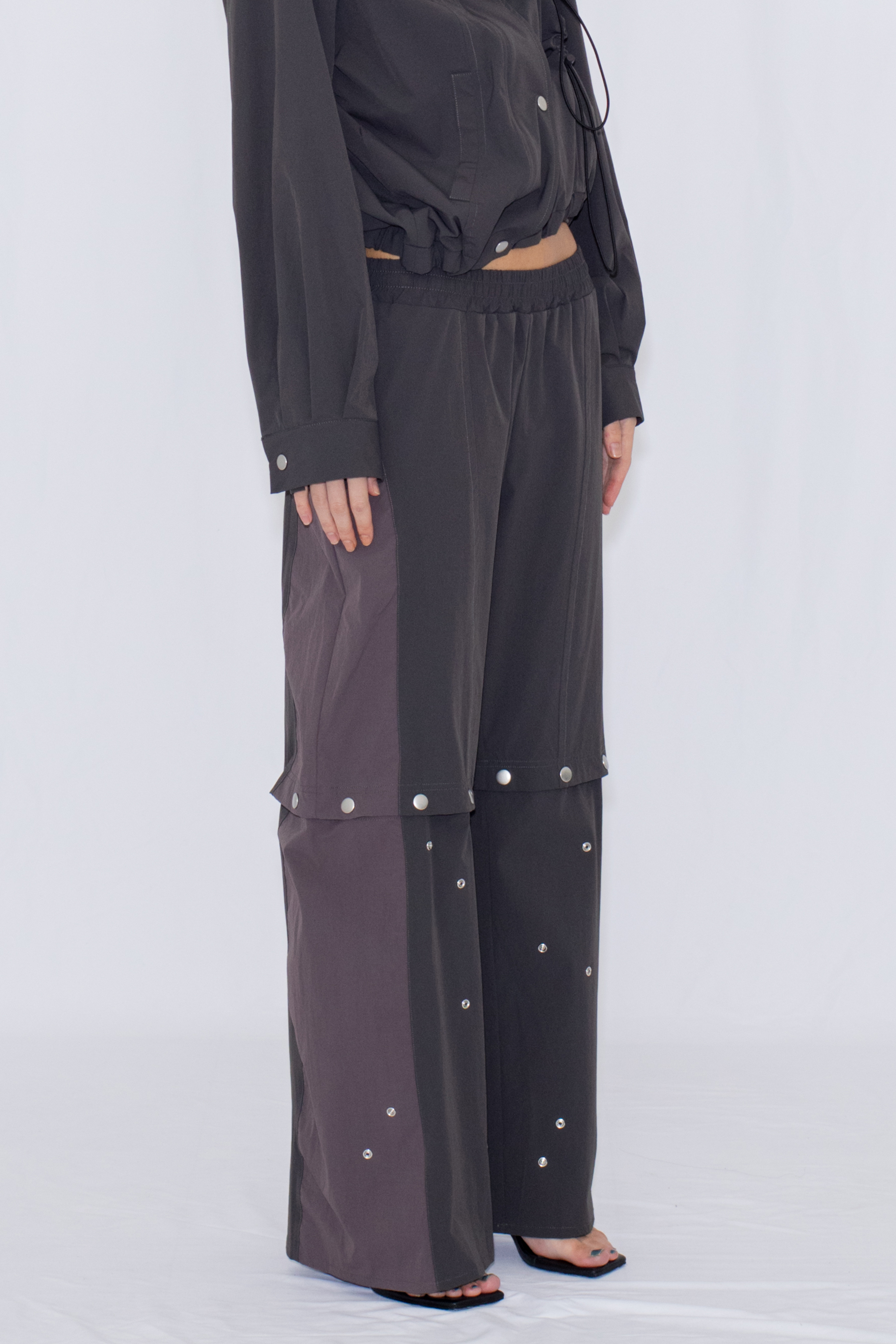 2WAY DEFORMED TRACK PANTS / CHARCOAL