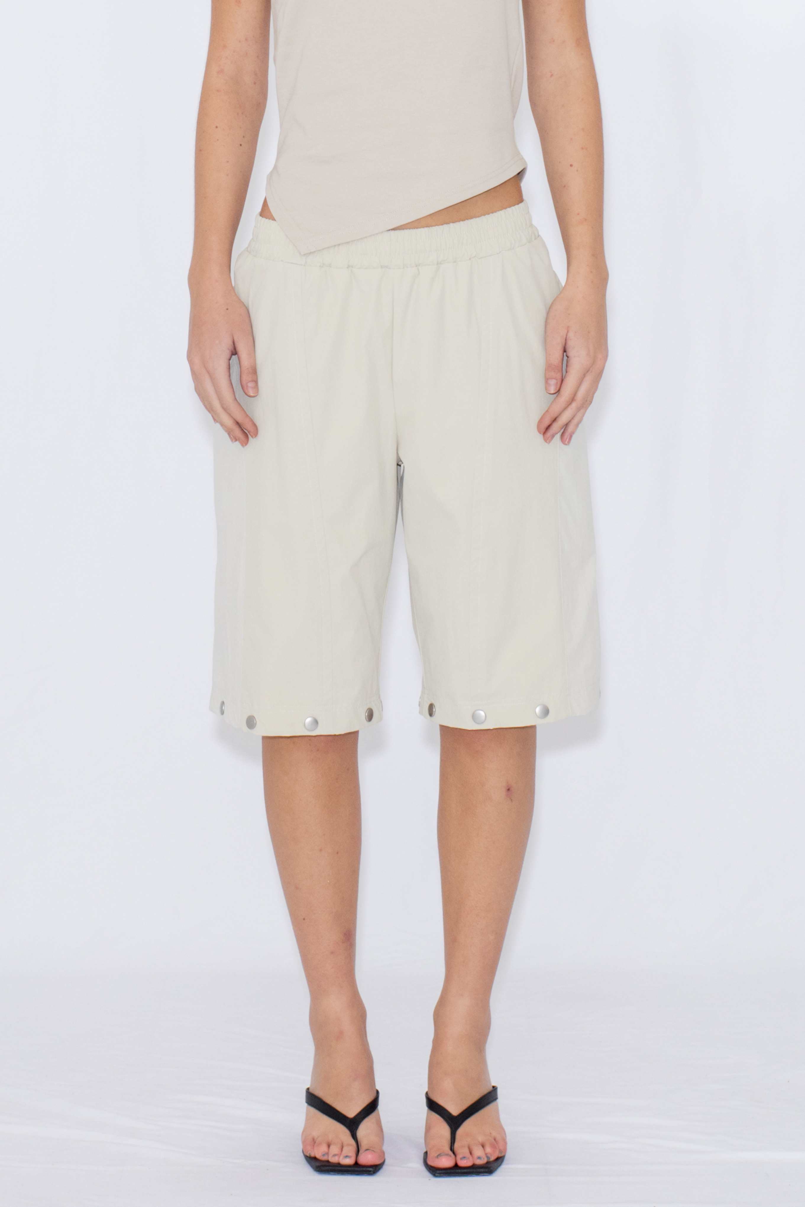 2WAY DEFORMED TRACK PANTS / IVORY