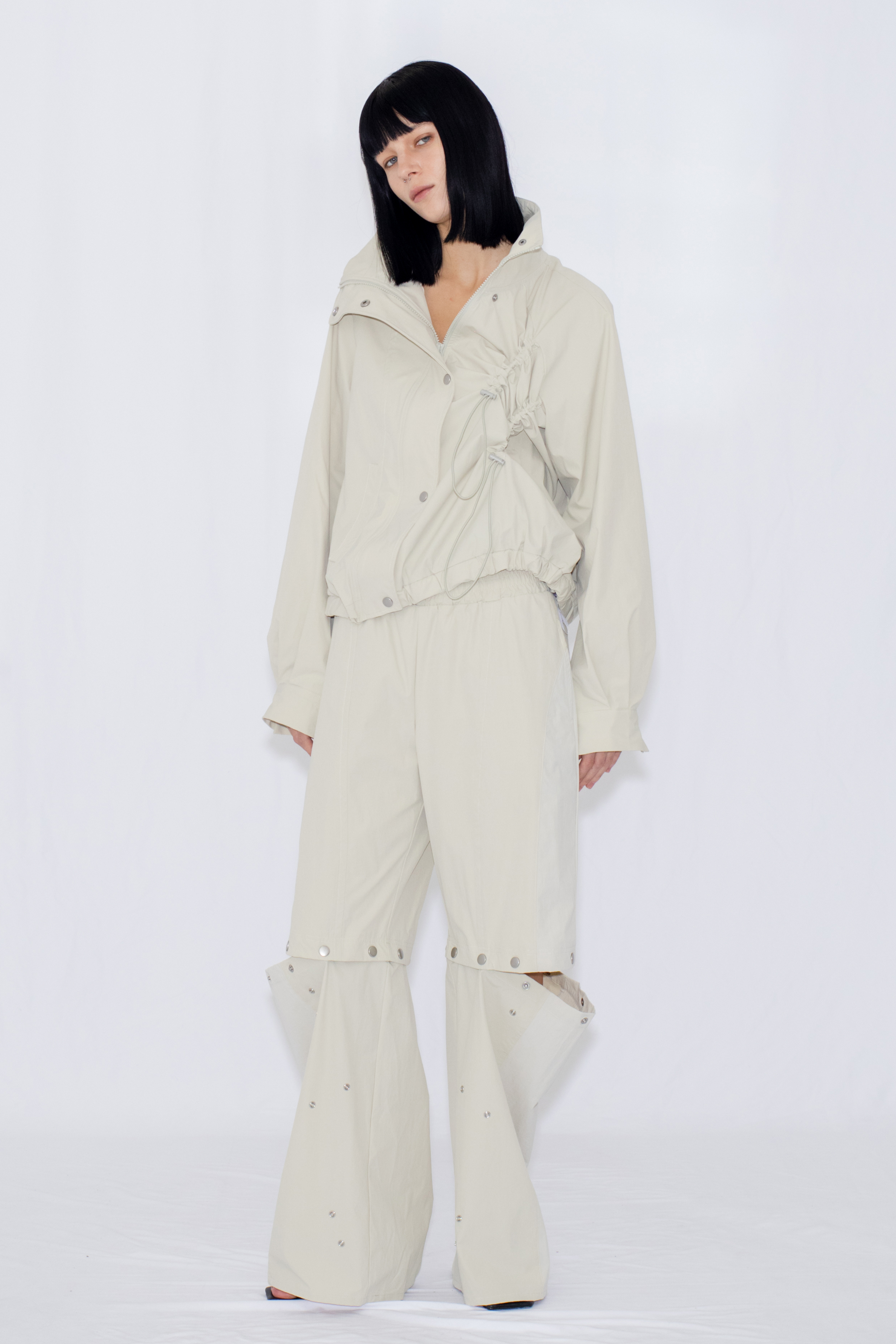2WAY DEFORMED TRACK PANTS / IVORY