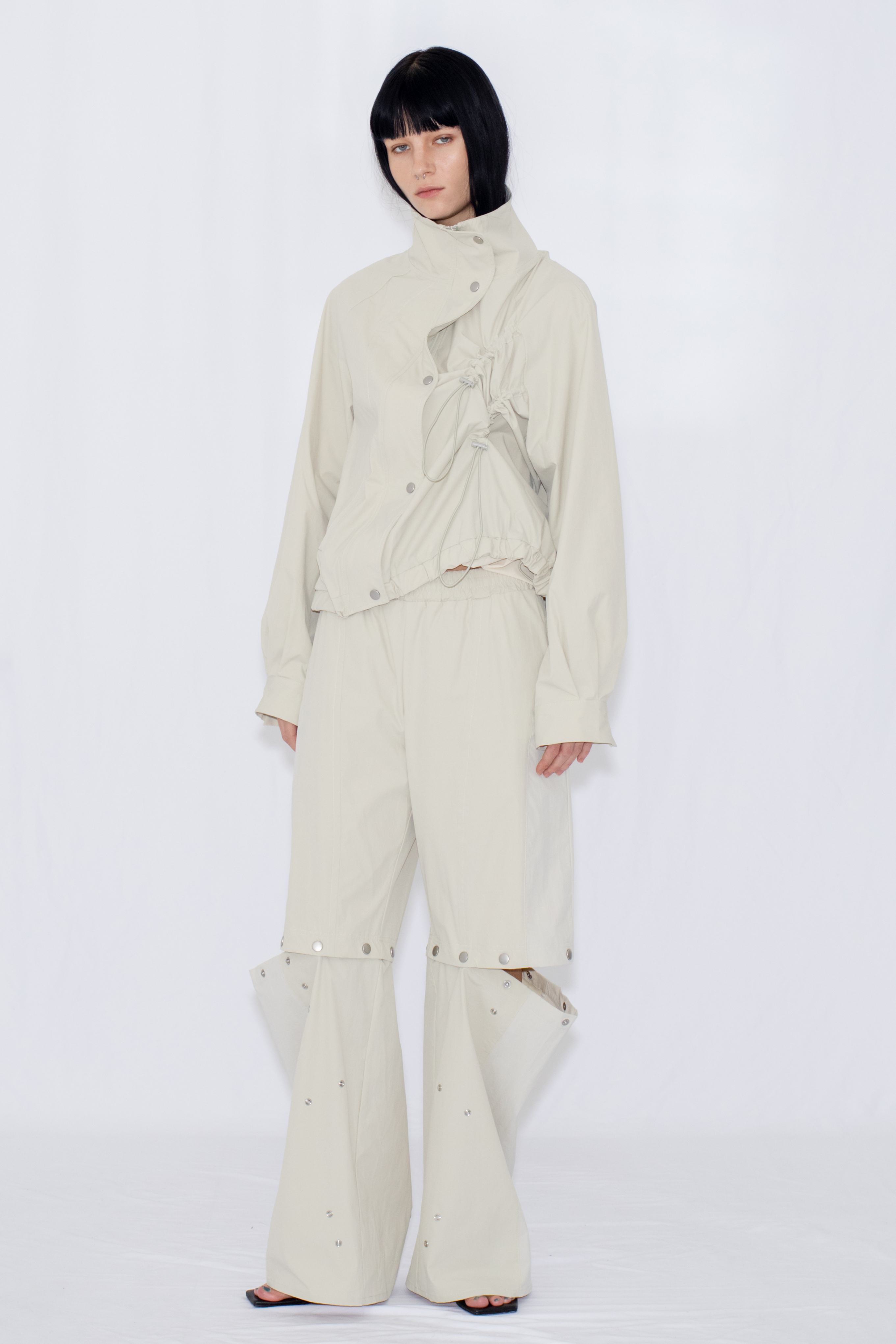 2WAY DEFORMED TRACK PANTS / IVORY
