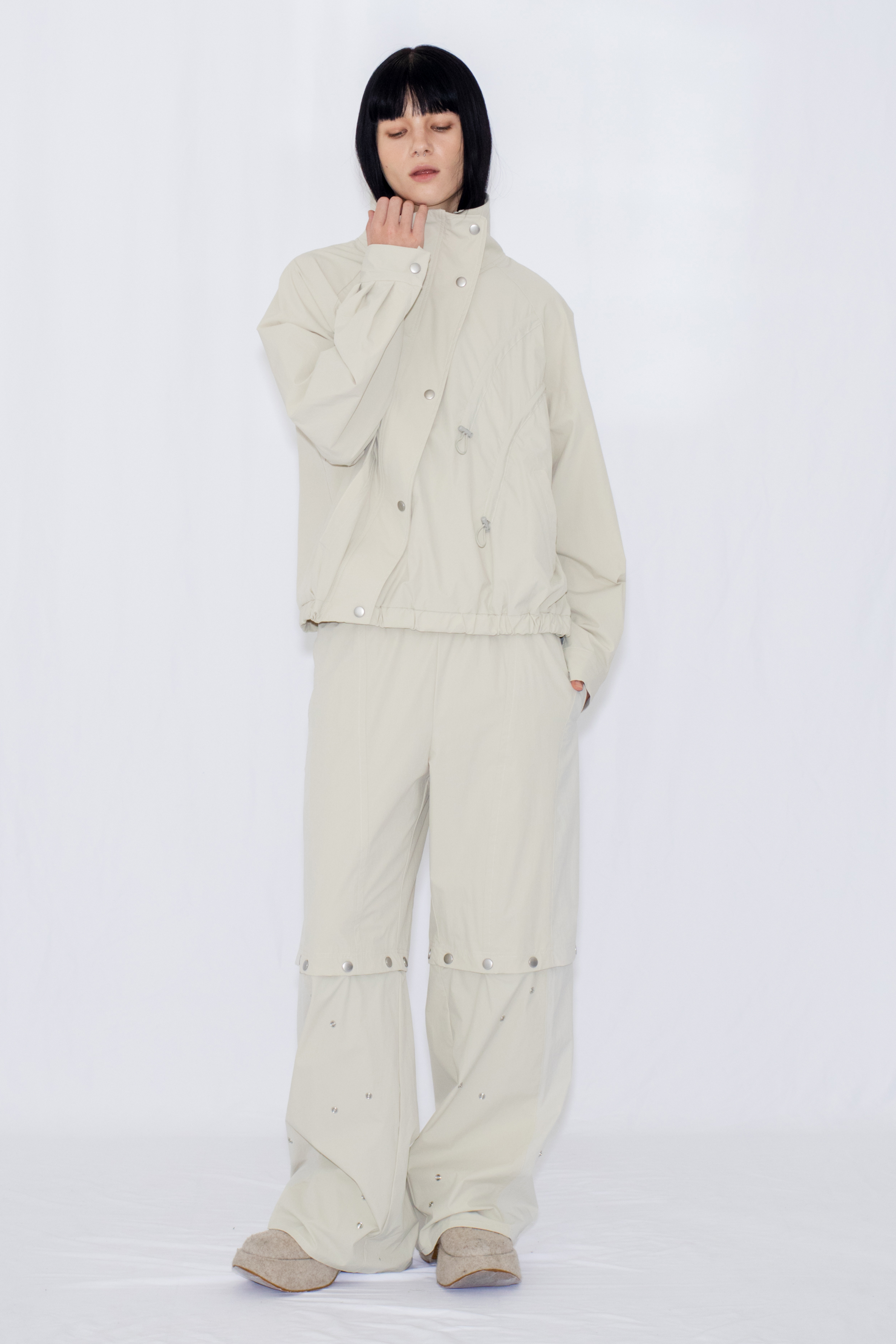 2WAY DEFORMED TRACK PANTS / IVORY