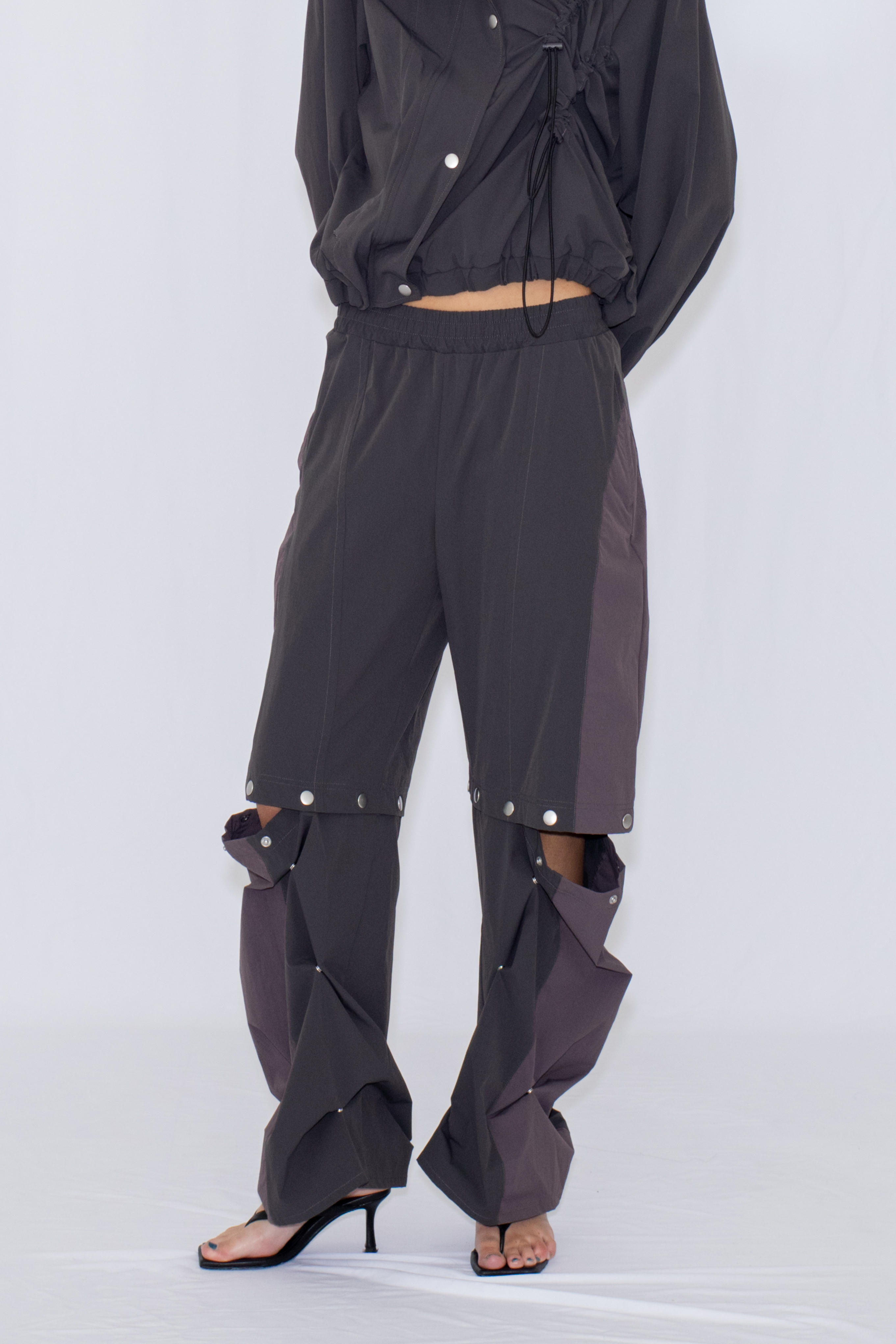 2WAY DEFORMED TRACK PANTS / CHARCOAL
