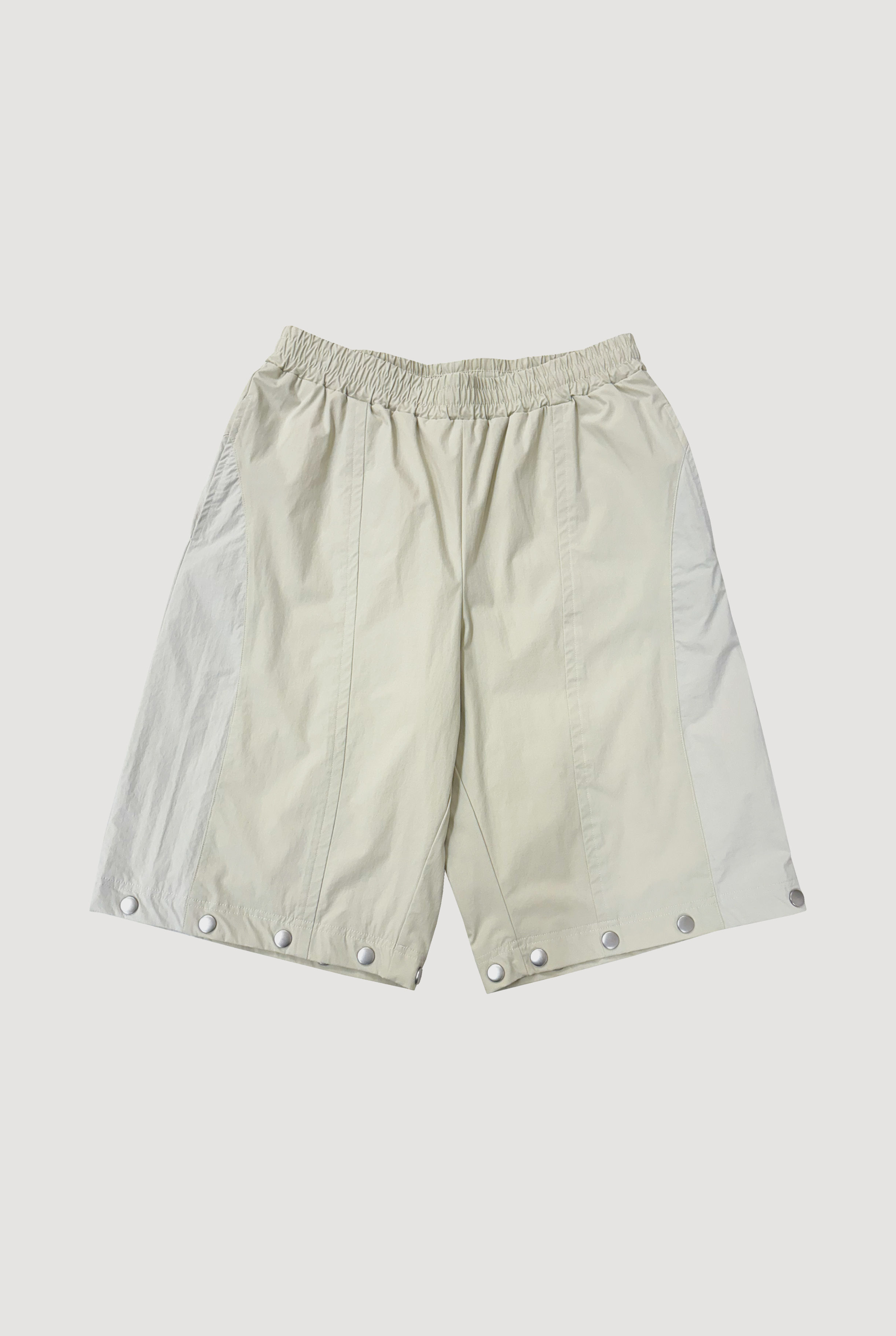 2WAY DEFORMED TRACK PANTS / IVORY