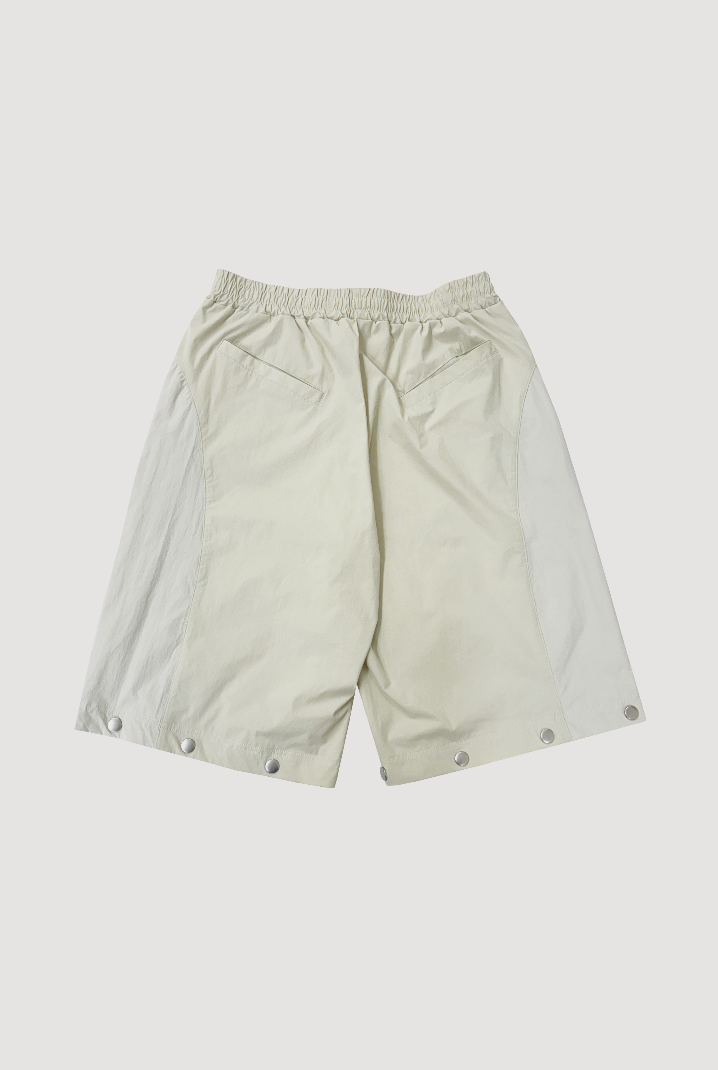 2WAY DEFORMED TRACK PANTS / IVORY