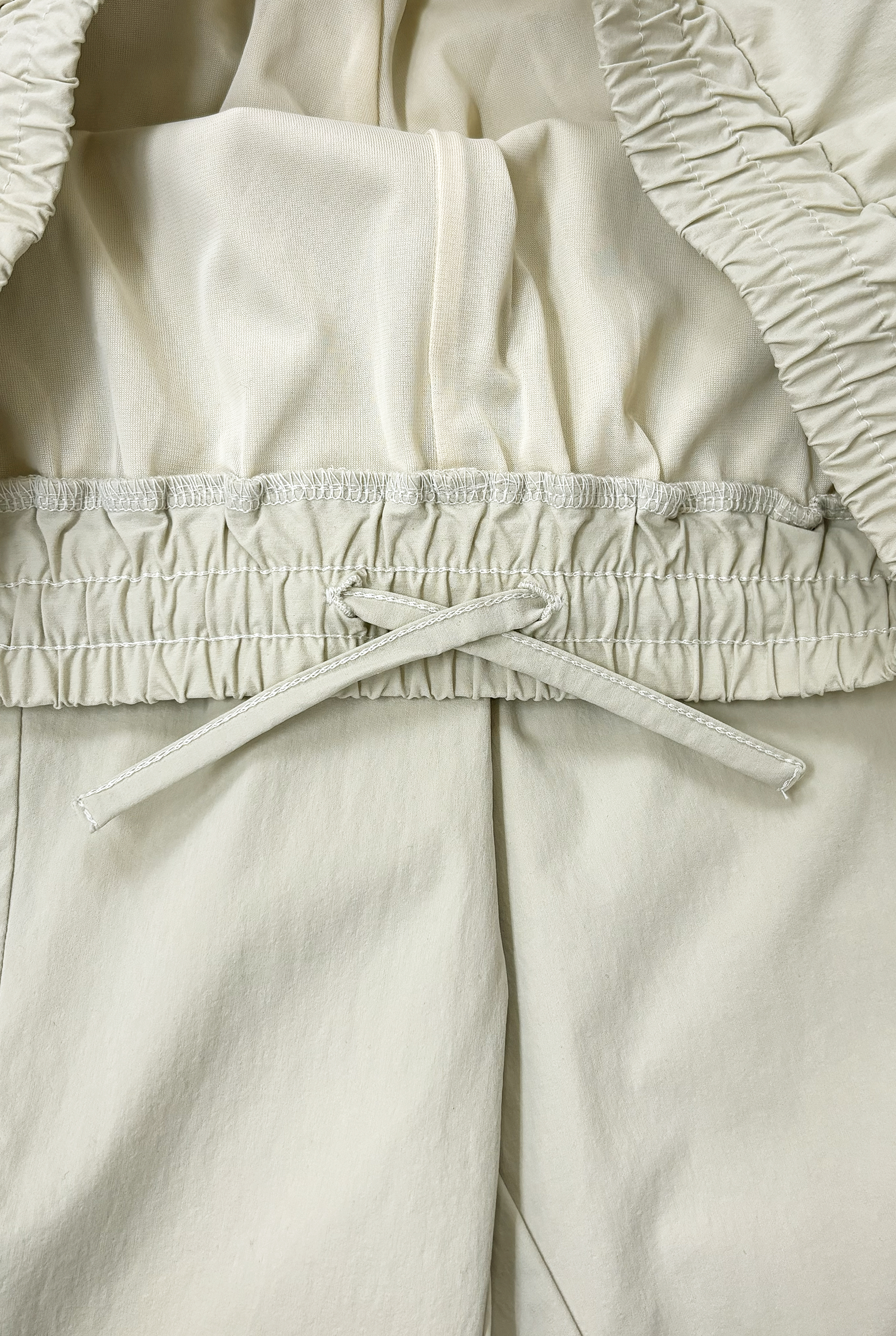 2WAY DEFORMED TRACK PANTS / IVORY